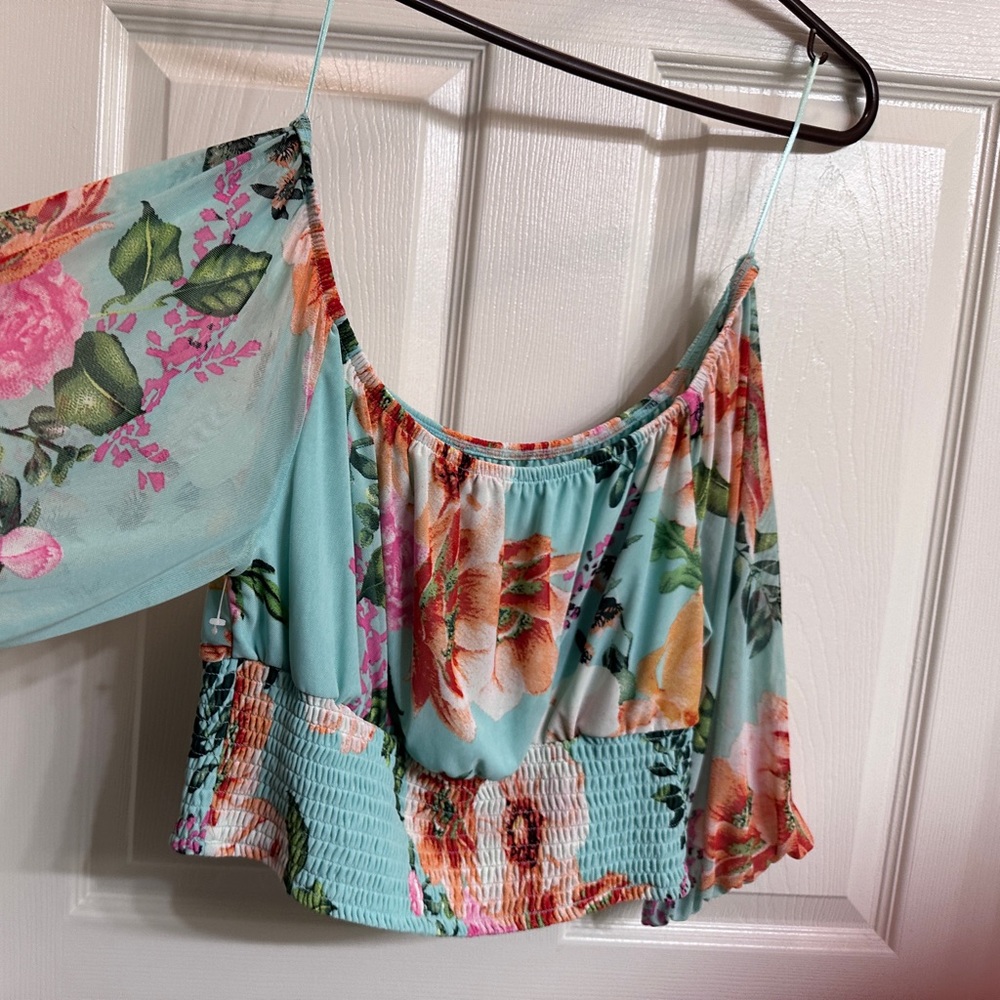 2 pc, built in short slip, flared legs with split on sides. elastic cuffs on top